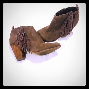 Steve Madden booties with fringe detailing.